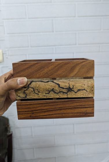 Wooden cutlery caddy with dark resin crack inlay, held in hand, custom made by RestroCart, New Delhi
