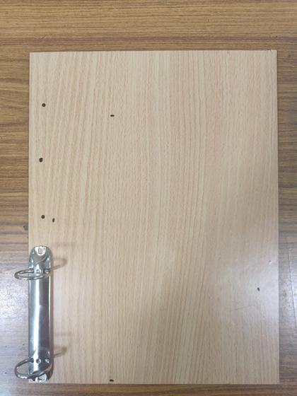 Light wood grain menu board with small ring binder and holes, custom made by RestroCart, New Delhi